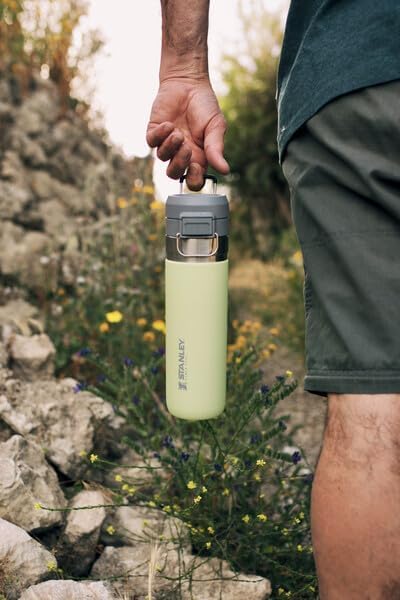 Stanley Quick Flip GO Water Bottle 24 oz | Push Button Lid | Leakproof and Packable for Travel and Sports | Insulated Stainless Steel | BPA-Free | Citron