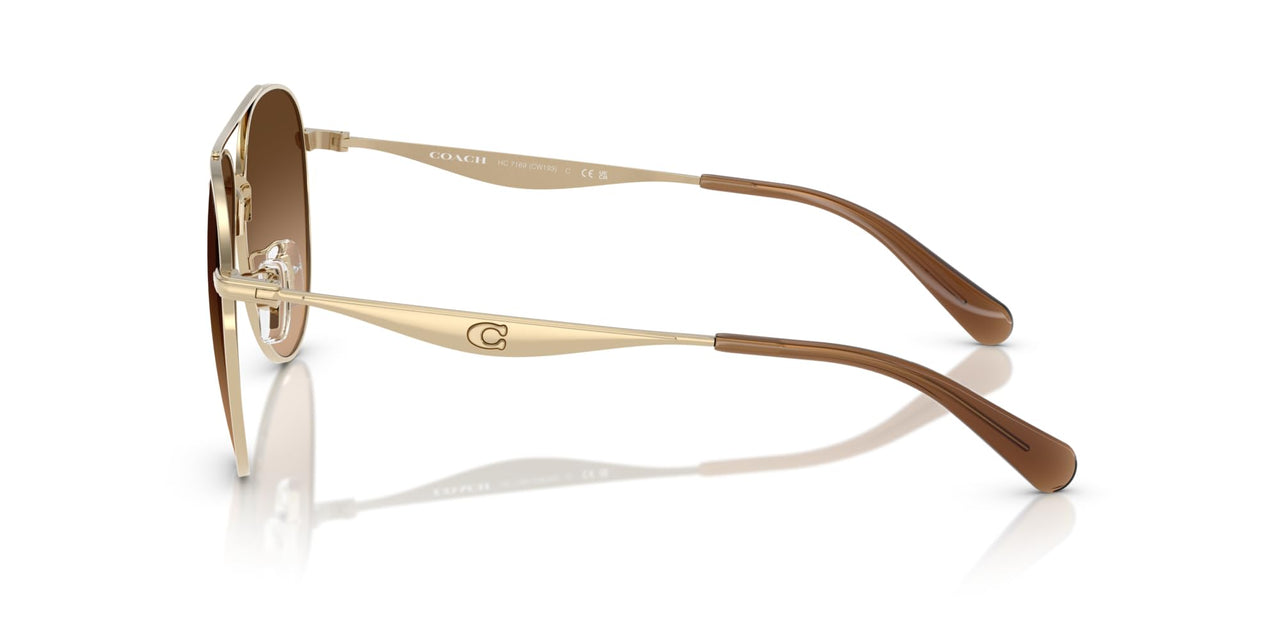 COACH Women's HC7169 Metal C Hardware Aviator Sunglasses, Shiny Light Gold/Brown Gradient, 57 mm