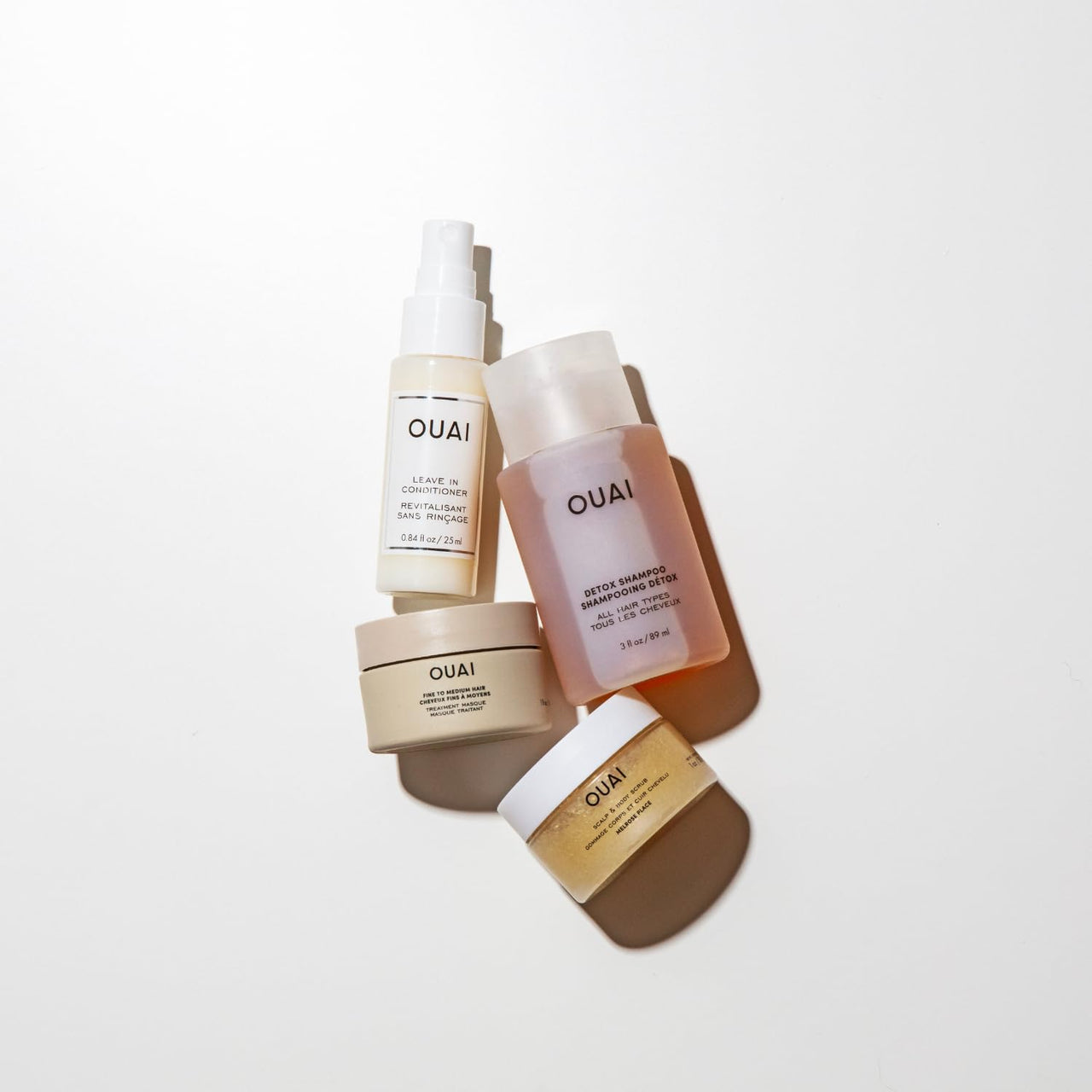 OUAI Travel Kit - Includes Travel Size Leave In Conditioner, Detox Shampoo, Fine to Medium Hair Mask, Scalp & Body Scrub (4 Count)