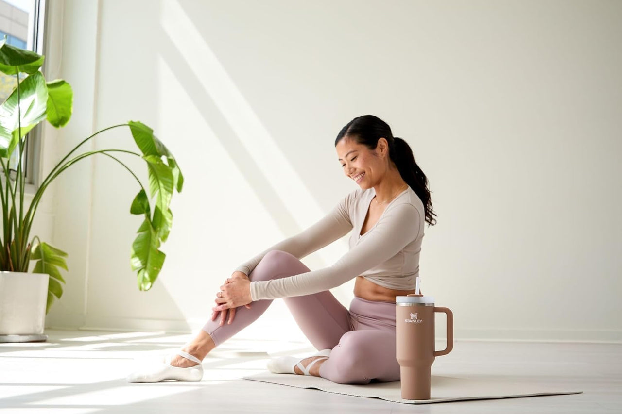 STANLEY Quencher H2.0 Tumbler with Handle and Straw 40 oz | Flowstate 3-Position Lid | Cup Holder Compatible for Travel | Insulated Stainless Steel Cup | BPA-Free | Almond Rose