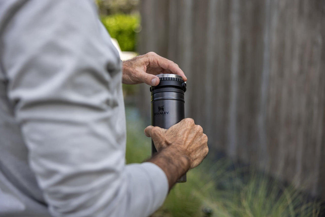STANLEY Travel Mug with Integrated French Press 16 oz | 5 Minute Brew, 4 Hours Hot, Leakproof Lid | Mesh Filter for Coffee Grounds | Insulated Stainless Steel Coffee Maker | BPA-Free | Charcoal Glow