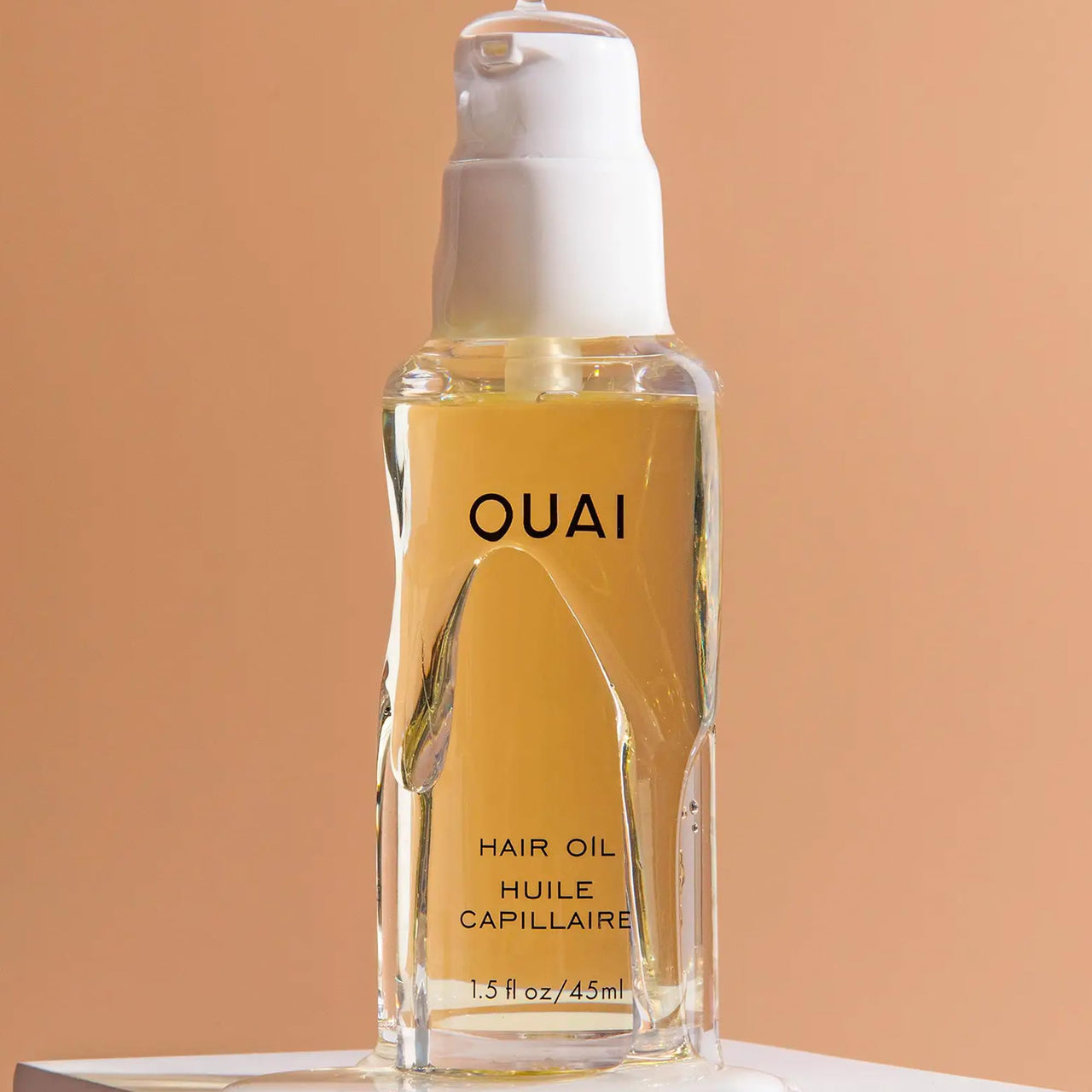 OUAI Hair Oil - Hair Heat Protectant Oil for Frizz Control - Adds Shine and Smooths Split Ends - Color Safe Formula - Paraben, Phthalate and Sulfate Free (1.5 fl oz)