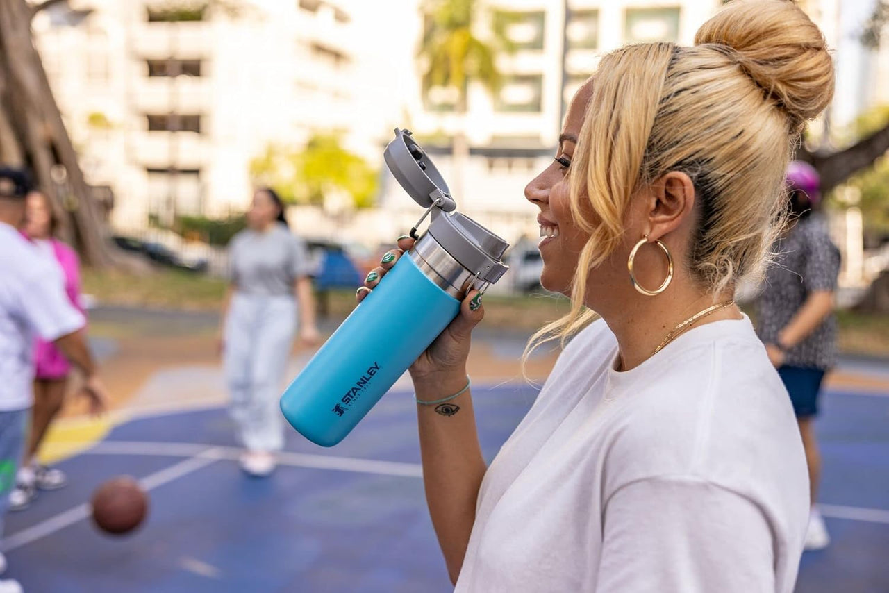 Stanley Quick Flip GO Water Bottle 24 oz | Push Button Lid | Leakproof and Packable for Travel and Sports | Insulated Stainless Steel | BPA-Free | Pool