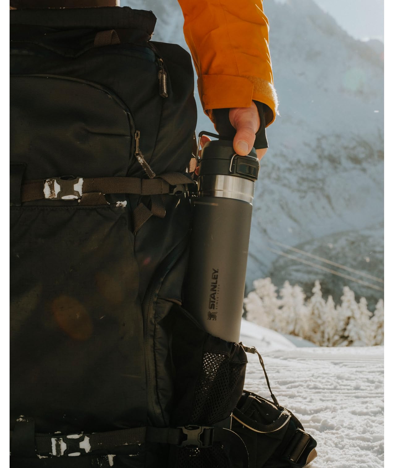 STANLEY Quick Flip GO Water Bottle 24 oz | Push Button Lid | Leakproof and Packable for Travel and Sports | Insulated Stainless Steel | BPA-Free | Tigerlily