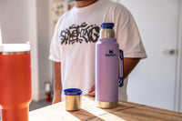 Thumbnail for Stanley Classic Legendary Vacuum Bottle 1.5 qt | Wide Mouth with Leakproof Cup Lid | Keep Drinks Hot or Cold | Packable for Travel | Insulated Stainless Steel Thermal Bottle | BPA-Free | Lavender