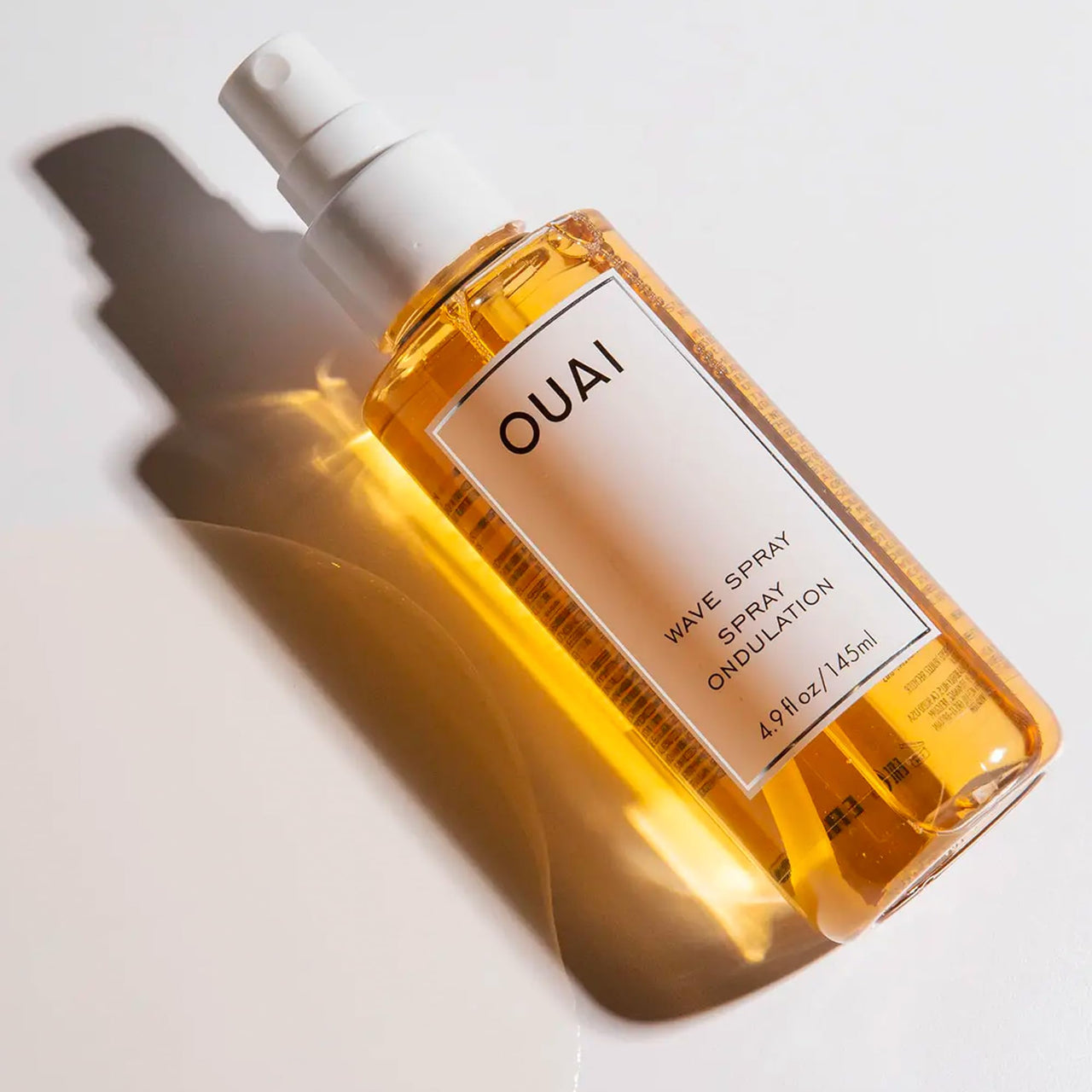 OUAI Wave Spray - Coconut Oil & Rice Protein Texture Mist for Voluminous Beach Waves with Shine - Paraben Free, Safe for Color & Keratin-Treated Hair (4.9 fl oz)