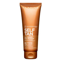 Thumbnail for Clarins Self Tanning Milky Lotion | Self Tanner For Face and Body | Natural, Long-Lasting, Streak-Free, Sun-Kissed Glow and 24-Hour Hydration* | Non-Staining | Contains Glycerin | 4.2 Ounces
