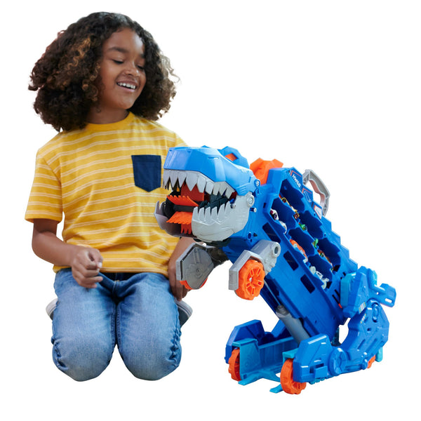 Hot Wheels City Toy Car Track Set, Ultimate T-Rex Transporter, Hauler Transforms into Stomping Dino with Race Track, from Netflix Series “Let’s Race”
