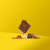 Thumbnail for Tony’s Chocolonely Belgian Milk Chocolate Honey Almond Nougat Candy Bar for Snacks, Chocolate Bar for Party Favors, Gifts, or Gift Basket, 32% Cacao, Made From Quality Fairtrade Cocoa, 6.35 Oz