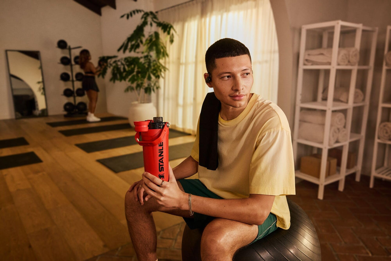 STANLEY Vitalize Shaker Bottle 20 oz | Leakproof Insulated Stainless Steel Shaker Cup | Base Storage and Twist On Fast Flow Lid | Protein Shakes and Pre Workout Powder | BPA-Free | Chili Red