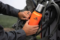Thumbnail for Stanley Classic Legendary Vacuum Bottle 1.5 qt | Wide Mouth with Leakproof Cup Lid | Keep Drinks Hot or Cold | Packable for Travel | Insulated Stainless Steel Thermal Bottle | BPA-Free | Blaze Orange