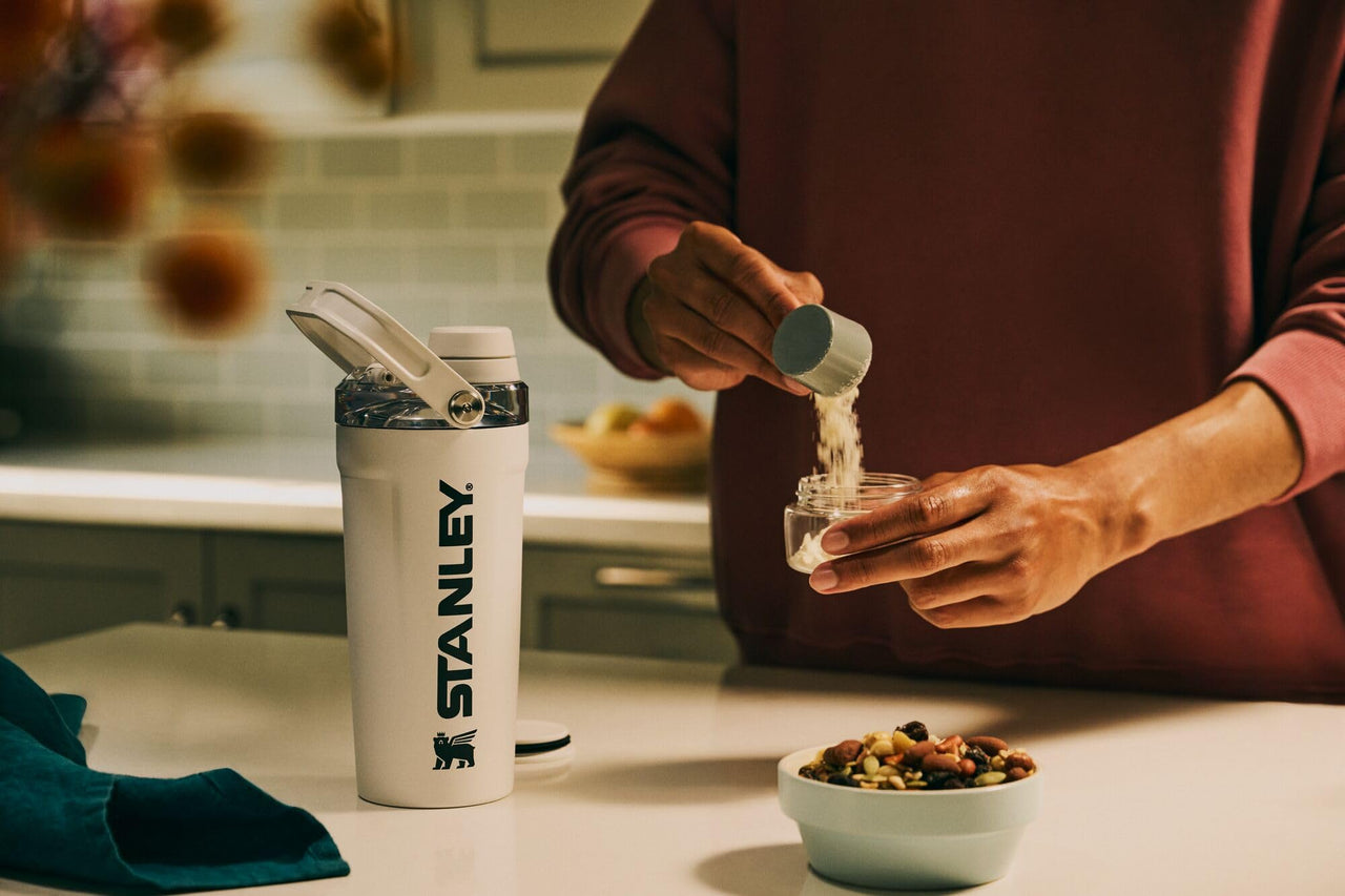 STANLEY Vitalize Shaker Bottle 20 oz | Leakproof Insulated Stainless Steel Shaker Cup | Base Storage and Twist On Fast Flow Lid | Protein Shakes and Pre Workout Powder | BPA-Free | Dried Pine