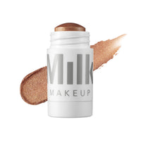 Thumbnail for Milk Makeup Highlighter – Cream Highlighter Stick for Face + Body with Radiant, Shimmery Glow – Buildable, Blendable, Vegan Formula for All Skin Types – Spark, 0.21 oz