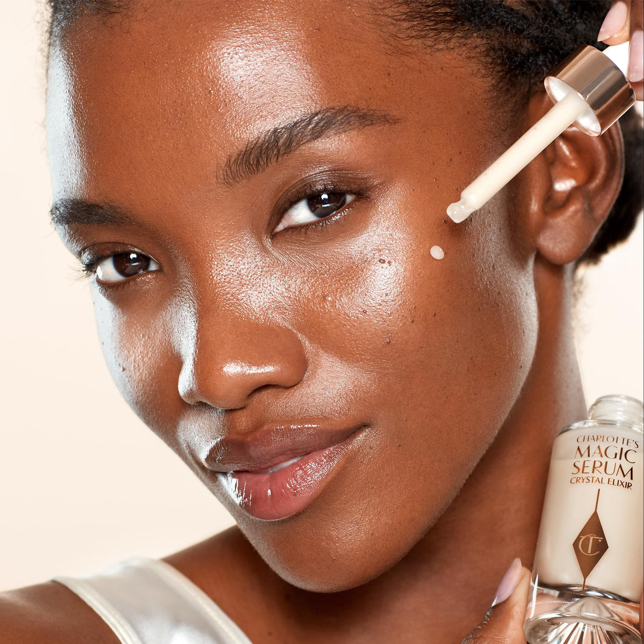 Charlotte Tilbury Magic Serum Crystal Elixir - Anti Aging Skincare Set - Face Firming Peptide, Brightening Vitamin C Serum & Glow-Boosting Niacinamide - Perfect for Gifting & Makeup Pairings (8ml)