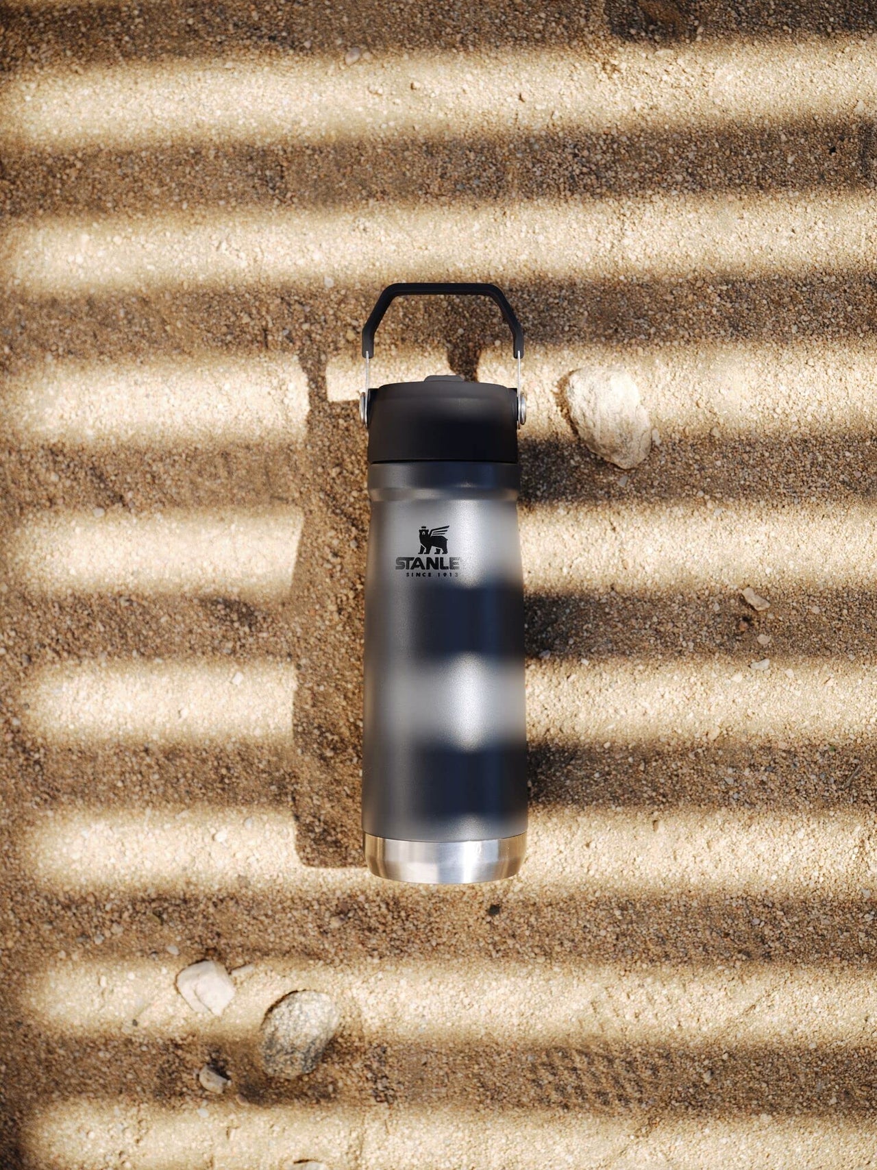 STANLEY IceFlow Flip Straw Water Bottle 22 oz | Built-In Straw for Travel and Sports | Lightweight and Leak Resistant | Insulated Stainless Steel | BPA-Free | Charcoal