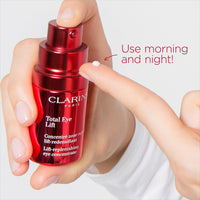 Thumbnail for Clarins, Total Lift LiftReplenishing Total Ounce, clear, A high-performance lifting eye concentrate, 0.5 Fl Oz