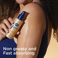 Thumbnail for Vaseline Radiant X Replenishing and Hydrating Body Oil with 1% Lipids, Jojoba Oil, Coconut Oil, & Vitamin E 3.7 oz