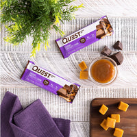 Thumbnail for Quest Nutrition Caramel Chocolate Chunk Protein Bar, 20g Protein, 1g Sugar, 4g Net Carbs, Gluten Free, Keto Friendly, 12 Count