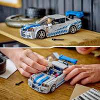 Thumbnail for Lego Speed Champions 2 Fast 2 Furious Nissan Skyline GT-R (R34) Set, Race Car Toy Model Building Kit for 9 Plus Year Old Boys & Girls, with Racer Minifigure, Collectible Gift for Kids 76917