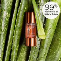 Thumbnail for Clarins Self Tanning Face Booster | Self Tanning Drops For Face To Mix With Moisturizer | Natural, Long-Lasting, Streak-No, Buildable Tan | Hydrates | Non-Staining | 99% Natural Ingredients | 0.5 Oz
