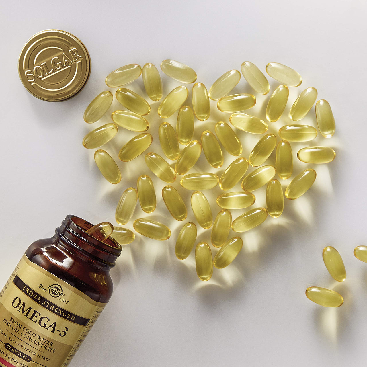 Solgar Triple Strength Omega-3 950 mg, 100 Softgels - Supports Cardiovascular, Joint & Skin Health - Heart Healthy Supplement - Essential Fatty Acids - Non GMO, Gluten Free, Dairy Free - 100 Count